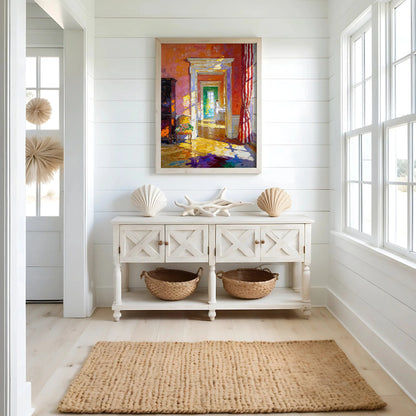 Decorative interior with a white console table, colorful painting, and natural elements.